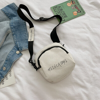 

Canvas bag female 2019 new casual simple&versatile shoulder bag retro solid color fashion personality letter Messenger bag