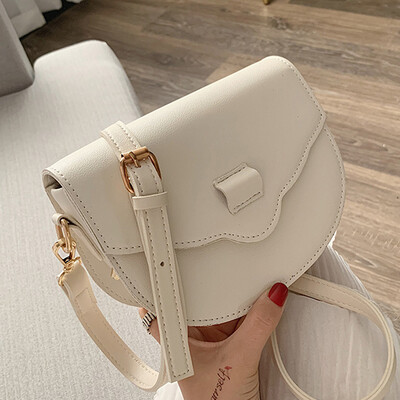 

North bag summer fresh 2019 new Korean womens shoulder semicircle retro saddle bag petal bag handbag