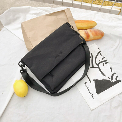 

Slantbag male&female couple personality fashion canvas mens bag student small backpack travel tide one-shoulder bag