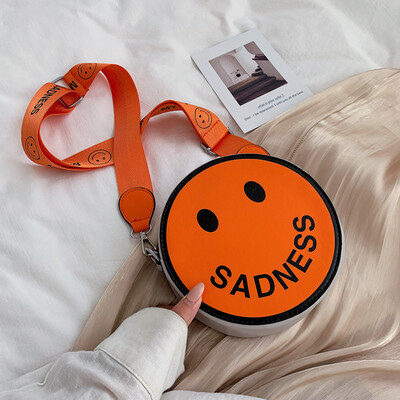 

Korean version ins cartoon wide shoulder band womens bag new 2019 texture small round bag single shoulder oblique satchel bag
