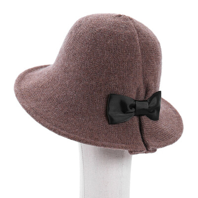 

Korean literature&art butterfly bonnet solid color wool knitted fisherman hat female big edge folding warm wool hat winte