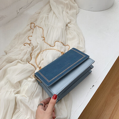 

Qiao Bani 2019 new Korean version of the fashion Dongdaemun matte embroidered line hit color flip cover bag shoulder shoulder bag