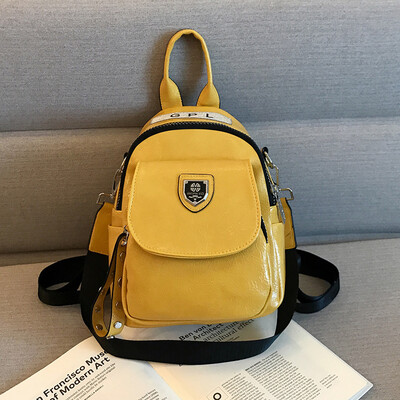

Double shoulder bag female bag new Korean version fashion rivet schoolbag leisure soft skin lady small backpack single shoulde