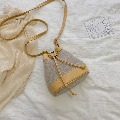 

Ins contrast color small bag summer high-grade foreign womens bag new 2019 fashion canvas bucket bag Messenger bag