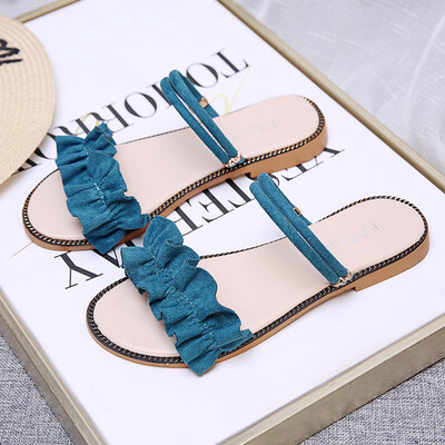 

Sandals female summer flat-bottomed Korean version 100 fairy sandals bow tie students wear two sandals on their toes
