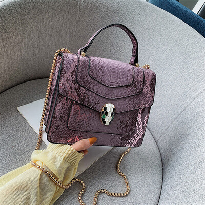 

Qiao Bani 2019 new European&American style fashion snake head BV snake pattern flip bag hand strap shoulder diagonal trend handbags