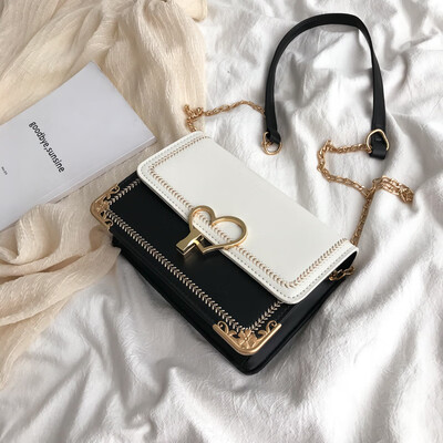 

Chic wild fashion temperament contrast color shoulder bag female 2019 new embroidered line peach heart-shaped lock buckle Messenger bag