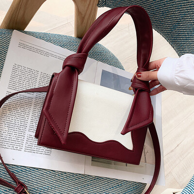 

New bag female 2019 new Korean version of the wild shoulder slung portable fashion hit color texture simple small square bag