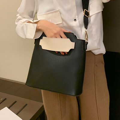 

Ins super fire Korean version of the contrast color wide shoulder strap bucket bag 2019 winter new simple fashion single shoulder Messenger bag tide