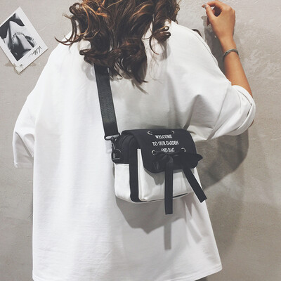 

2019 popular bag female new personality wild canvas shoulder Messenger bag net red girl bow small square bag