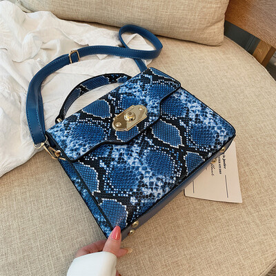 

Qiao Bani 2019 new European&American style fashion street beat snake pattern flip bag hand strap shoulder diagonal tide handbag