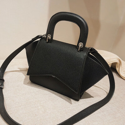 

Hong Kong style smiling face hand-held small bag woman 2019 new early spring wing bag advanced moisture single shoulder oblique sa