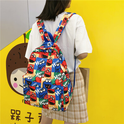 

Schoolbag female Korean Harajuku ulzzang junior high school high school students cartoon printed ins backpack ancient feeling back