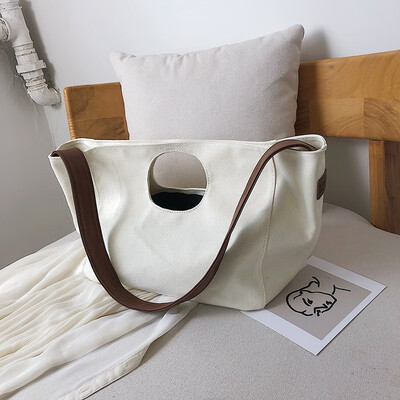 

Fashion casual simple wild color single shoulder bag female 2019 new temperament sports canvas portable small bag