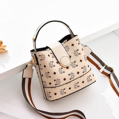 

Summer womens new recreational bucket bag temperament wide shoulder strap inclined handbag simple trend