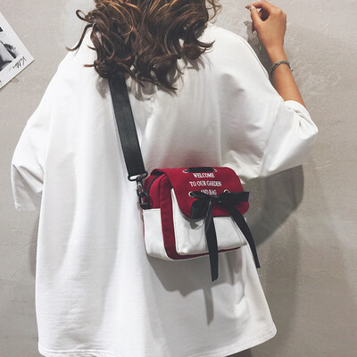 

2019 popular bag female new personality wild canvas shoulder Messenger bag net red girl bow small square bag