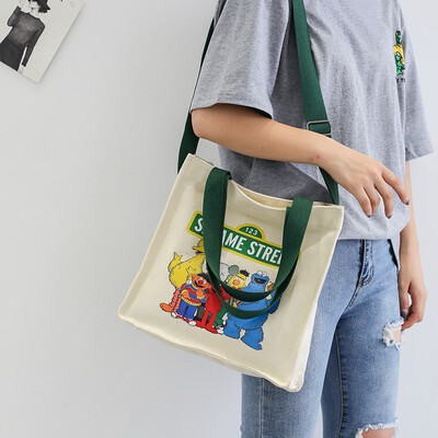 

Sesame Street slanted bag female canvas bag Korean version of large capacity single shoulder bag female student ins wind master ul