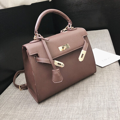 

Qiao Bani 2018 new European&American style fashion street shooting draw with lock Kelly bag hand shoulder shoulder diagonal PU handbag