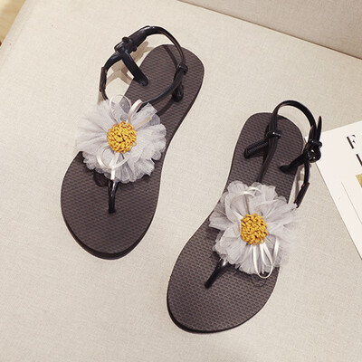Sandals female flower flat shoes Bohemian wind net red 2019 beach vacation students Joker Roman beach shoes