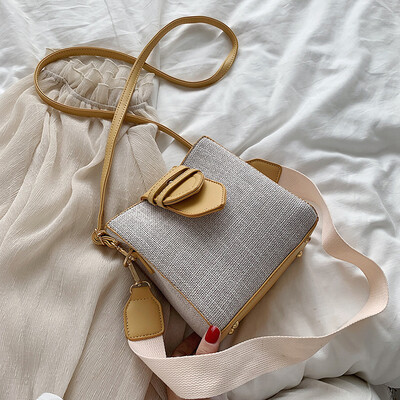 

Small bag female 2019 new wave Korean version of the wild gas wild canvas bucket bag fashion wide shoulder strap shoulder Messenger bag