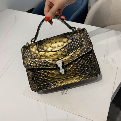 

Qiao Bani 2019 new European&American style fashion snake skin pattern BV snake head flip cover bag shoulder diagonal cross tide handbag