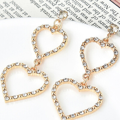 

Women Trendy Wild Fashion Temperament Heart-Shaped Tassel Retro Long Pattern Earrings