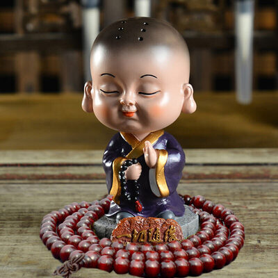 

Guangshunfa creative car decoration car decoration office decoration car ornaments shaking head small monk car ornaments cartoon car decoration products wish to become