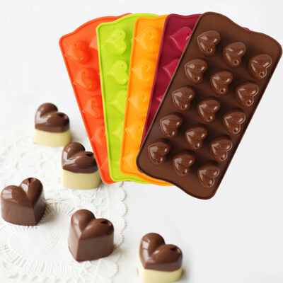 

Heart Shaped Silicone Molds Creates Heart-Shaped Chocolate Jell-O Candy or Ice Cubes