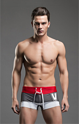

2018 new swimwear low waist stitching fashion V section tide swimwear mens flat corner swimming trunks