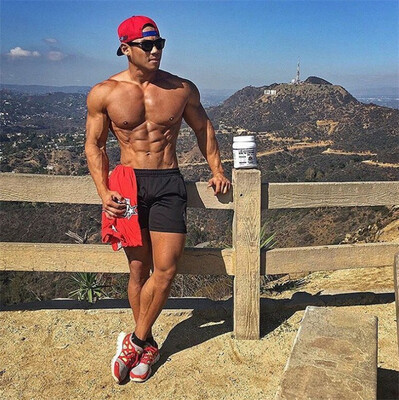 

Muscle Dr fitness brothers shorts male Slim running training pants pants sports casual cotton shorts