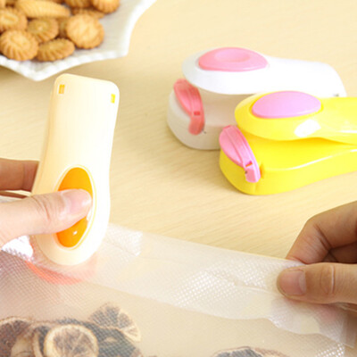 

Mini Sealing Machine Portable Travel Home Heat Plastic Bag Impluse Sealer Orange