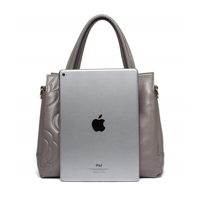 

New first layer cowhide rose embossed large capacity womens cross section shoulder slung handbag