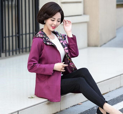 

Mom dressed in new autumn clothes 40-50 year old spring coat