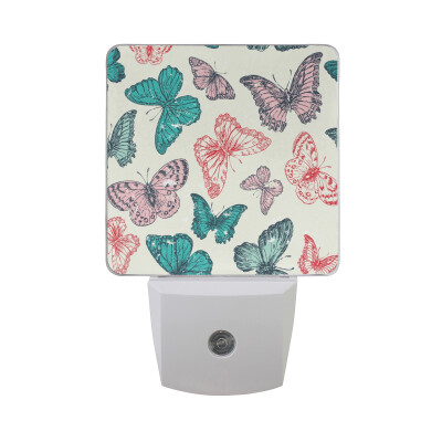 

ALAZA LED Night Light With Smart Dusk To Dawn SensorButterfly Tropical Leaves Flowers Plug In Night Light