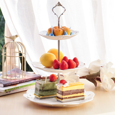 

Enjoy three layers of fruit plate European pure white relief selection ceramic fruit cake decoration plate