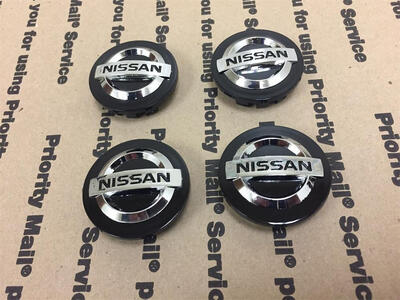 

НОВЫЙ NISSAN НАБОР 4 ЦЕНТР КОЛЕСО КОЛЕСА ОБОДА КОЛЕСА КОНЦЕНТРАТОРА КОНЦЕНТРАТОРЫ CAP ШАПКИ ЛОГОТИП ЧЕРНЫЙ 54 ММ