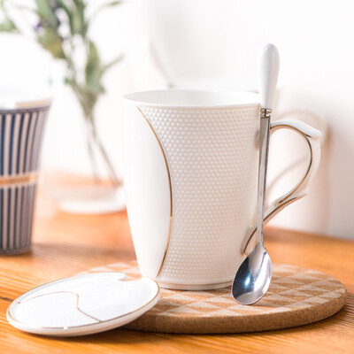 

Porcelain soul creative fashion personality ceramic water cup mug set suit gold side couple coffee cup with a belt spoon British wind weaving