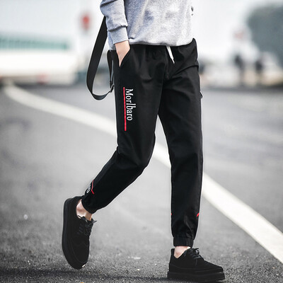 

Крокодил одежда (КРОКОДИЛ) модные случайные штаны мужчины Корейские тонкие буквы напечатаны брюки 17041CR6012 букета темно-синего L