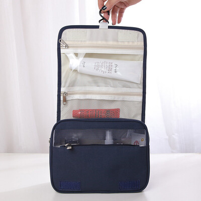 

The man washes the bags&bags the ladies makeup bag