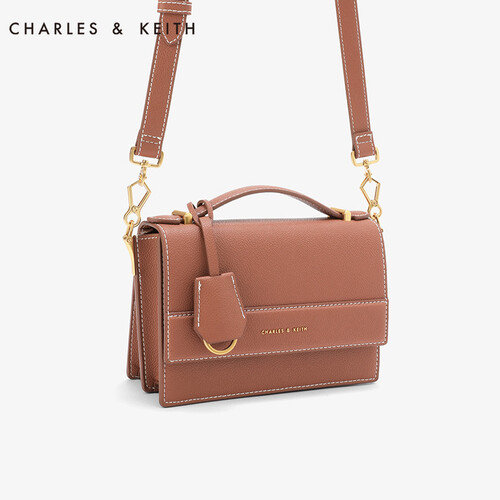 CHARLES&KEITH CK2-50780732欧美翻盖吊牌装饰女士秋千包 白兰地色 S