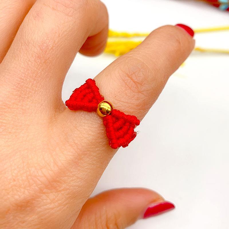 浙饰界手工编织在逃白雪公主戒指女迪士尼蝴蝶结手链金色转运珠手绳