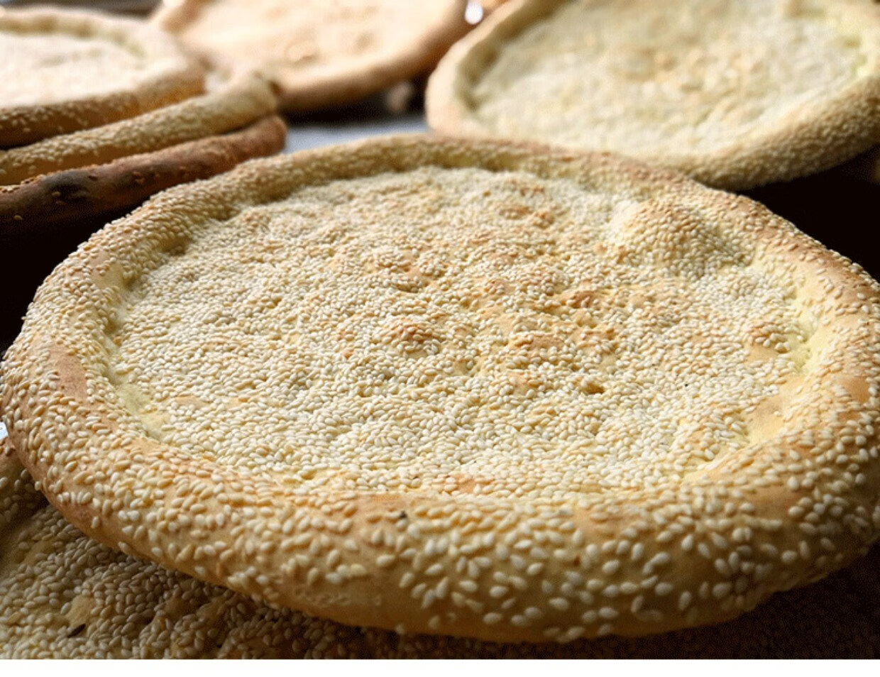 正宗新疆馕饼烤馕手工囊饼大芝麻牛奶馕皮牙子馕油馕特产美食小吃