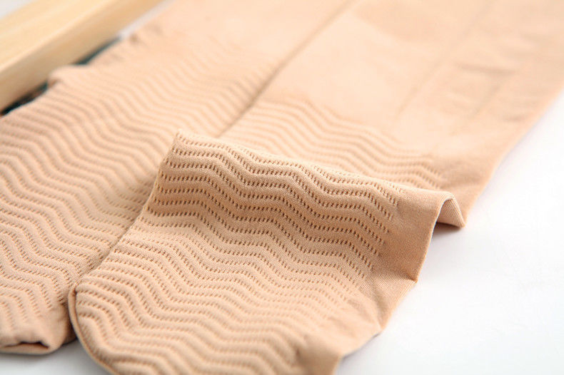 功能:美腿塑形图案:纯色类别:丝袜风格:简约筒高:高筒面料:天鹅绒厚度