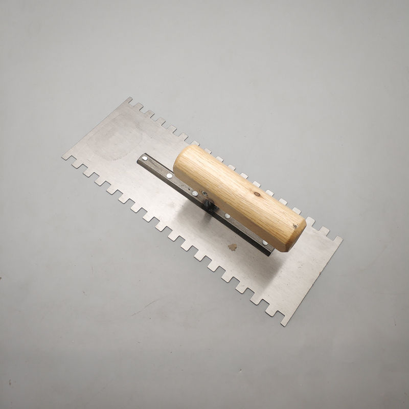 带齿抹灰刀抹子抹泥刀刮泥刀泥瓦工批刮灰刀泥板锯齿铺瓷砖工具q 左边