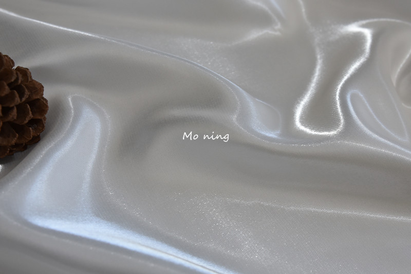 婚服布料超亮液体水光缎布料光滑硬挺金属亮光水晶丝缎婚纱礼服设计师