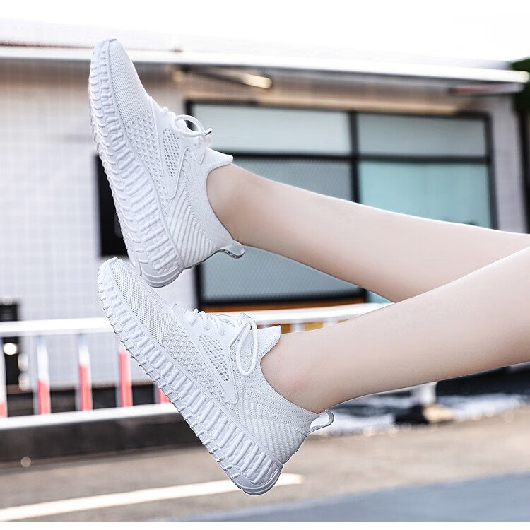 卡耐斯少女白色透气飞织鞋女学生休闲鞋子新款运动潮鞋青少年女学生
