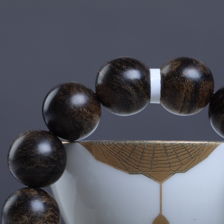 桃花诺沉水级文莱奇楠沉香达拉干沉水高油密度沉香佛珠手串保真老料