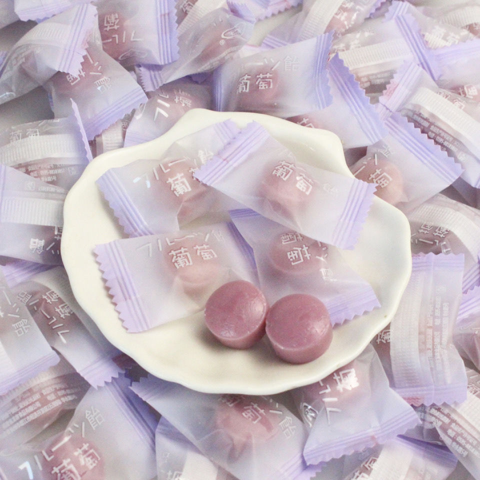 日系の白桃水果汁硬糖水蜜桃味创意结婚喜糖批发散装网红糖果白桃味