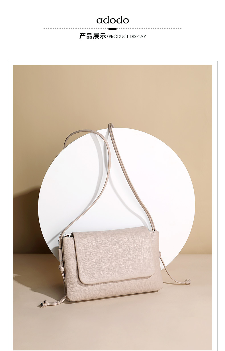 半坡adodo斜挎包女包2021新款潮头层牛皮小众感百搭斜挎小包包杏色240