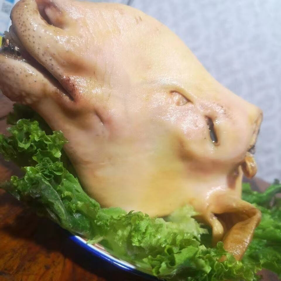 生羊头带皮整个新鲜熟羊头肉内蒙古羊脑羊蹄批发手工火烧羊头3335囎料